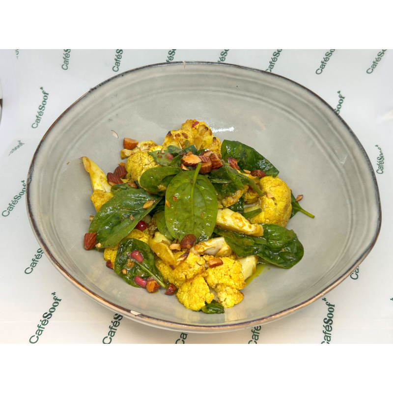 Salade Geroosterde Bloemkool met hazelnoot en granaatappel